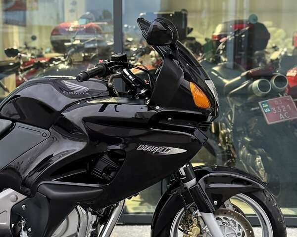 Фиолетовый Хонда NT 650V Deauville, объемом двигателя 0.65 л и пробегом 38 тыс. км за 3499 $, фото 25 на Automoto.ua