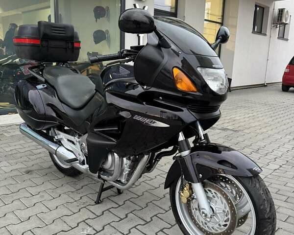 Фиолетовый Хонда NT 650V Deauville, объемом двигателя 0.65 л и пробегом 38 тыс. км за 3499 $, фото 3 на Automoto.ua