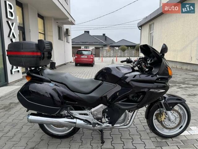 Фиолетовый Хонда NT 650V Deauville, объемом двигателя 0.65 л и пробегом 38 тыс. км за 3499 $, фото 11 на Automoto.ua