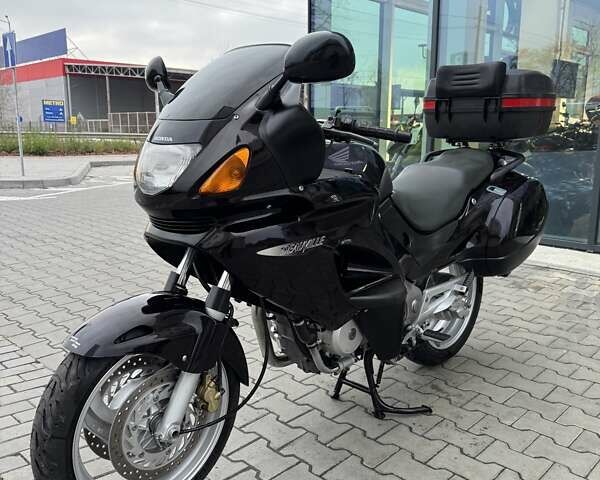 Фиолетовый Хонда NT 650V Deauville, объемом двигателя 0.65 л и пробегом 38 тыс. км за 3499 $, фото 4 на Automoto.ua