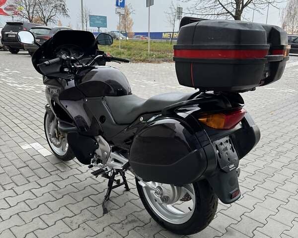 Фиолетовый Хонда NT 650V Deauville, объемом двигателя 0.65 л и пробегом 38 тыс. км за 3499 $, фото 6 на Automoto.ua