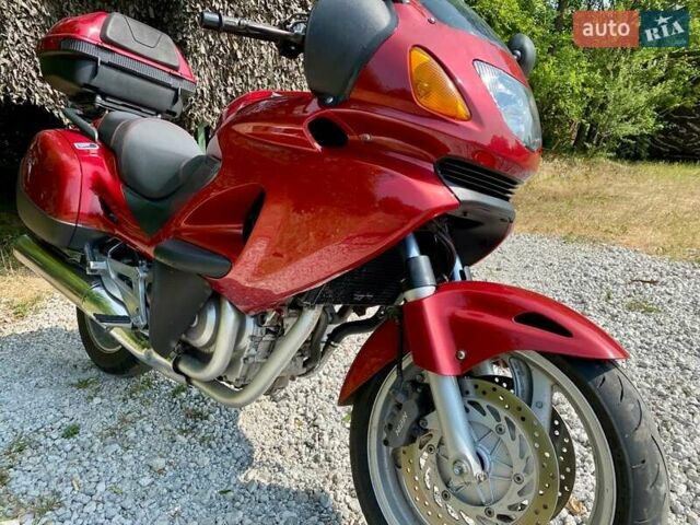 Красный Хонда NT 650V Deauville, объемом двигателя 0.65 л и пробегом 50 тыс. км за 3800 $, фото 2 на Automoto.ua