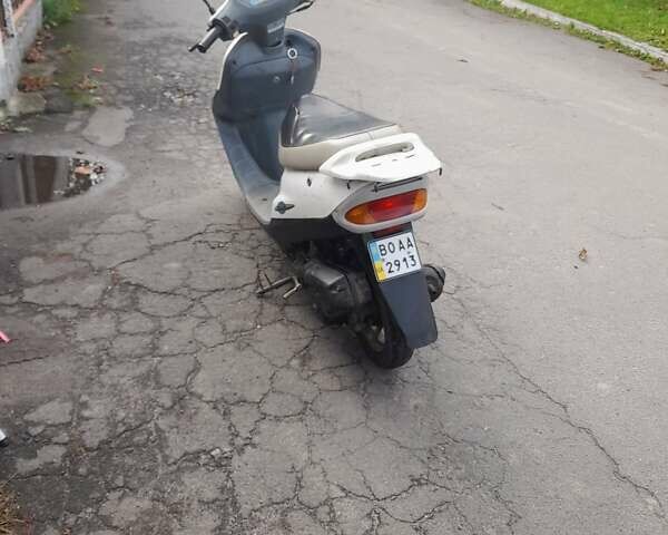 Белый Хонда Tact AF-30, объемом двигателя 0.05 л и пробегом 100 тыс. км за 280 $, фото 3 на Automoto.ua