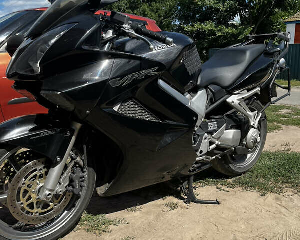 Черный Хонда VFR 800F Interceptor, объемом двигателя 0.8 л и пробегом 36 тыс. км за 5700 $, фото 1 на Automoto.ua
