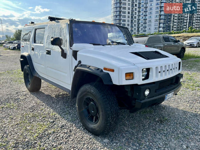 Белый Хаммер Н2, объемом двигателя 5.97 л и пробегом 120 тыс. км за 14300 $, фото 2 на Automoto.ua