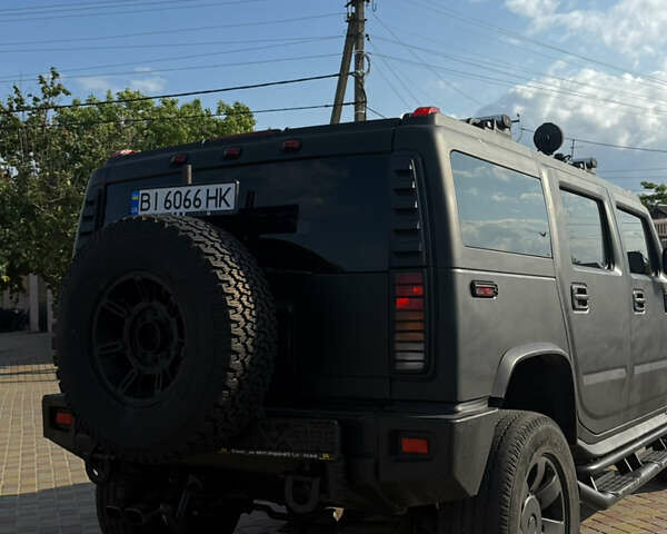 Черный Хаммер Н2, объемом двигателя 5.97 л и пробегом 333 тыс. км за 23600 $, фото 4 на Automoto.ua