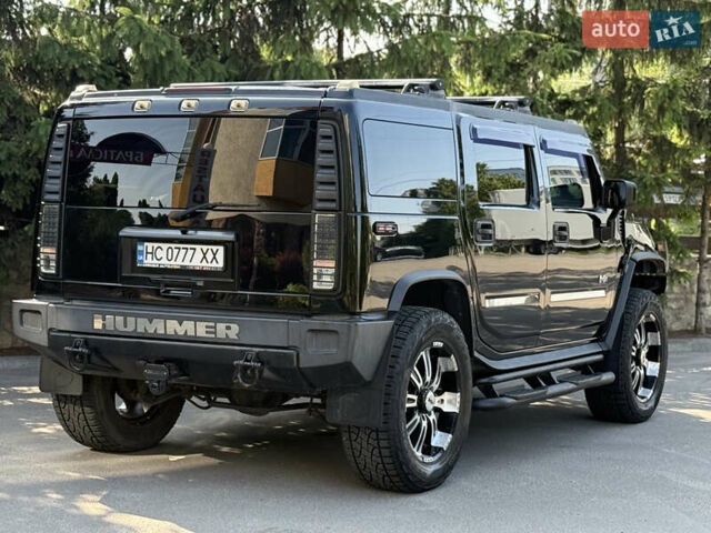 Черный Хаммер Н2, объемом двигателя 6.16 л и пробегом 190 тыс. км за 22999 $, фото 7 на Automoto.ua