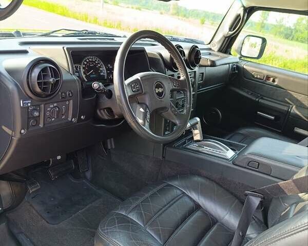 Черный Хаммер Н2, объемом двигателя 5.96 л и пробегом 48 тыс. км за 49999 $, фото 11 на Automoto.ua