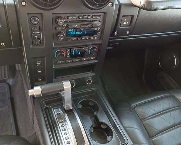 Черный Хаммер Н2, объемом двигателя 5.96 л и пробегом 48 тыс. км за 49999 $, фото 3 на Automoto.ua