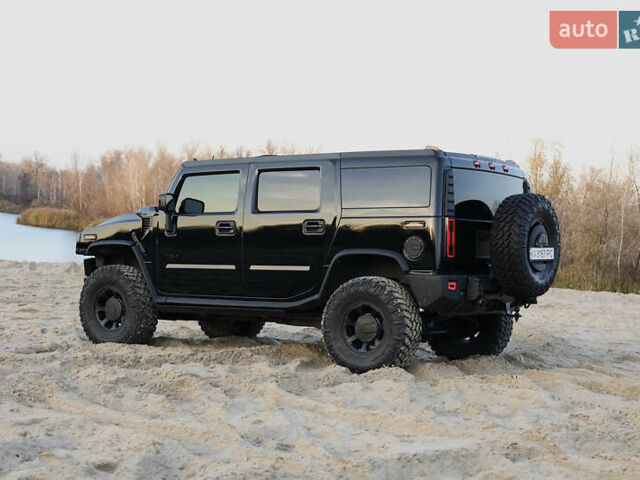 Чорний Хаммер Н2, об'ємом двигуна 6.2 л та пробігом 67 тис. км за 67000 $, фото 4 на Automoto.ua