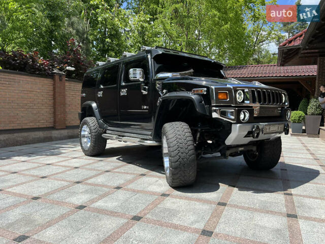 Чорний Хаммер Н2, об'ємом двигуна 6.2 л та пробігом 156 тис. км за 51000 $, фото 33 на Automoto.ua