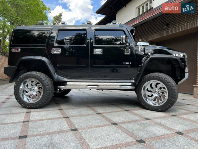 Чорний Хаммер Н2, об'ємом двигуна 6.2 л та пробігом 156 тис. км за 51000 $, фото 34 на Automoto.ua