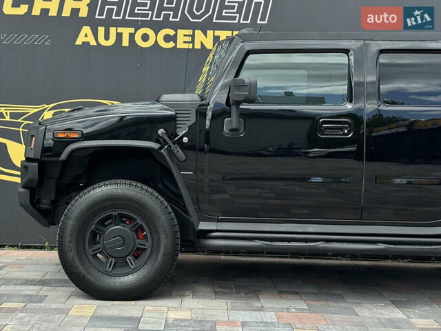Черный Хаммер Н2, объемом двигателя 6.2 л и пробегом 326 тыс. км за 36500 $, фото 7 на Automoto.ua