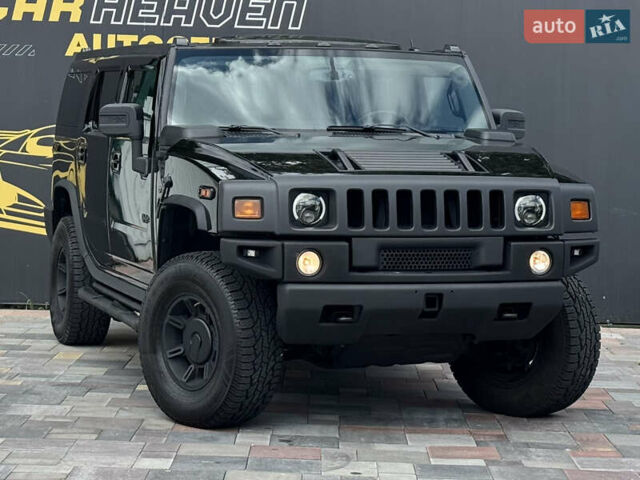 Черный Хаммер Н2, объемом двигателя 6.2 л и пробегом 326 тыс. км за 36500 $, фото 2 на Automoto.ua