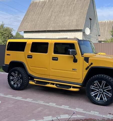 Жовтий Хаммер Н2, об'ємом двигуна 5.97 л та пробігом 175 тис. км за 23000 $, фото 2 на Automoto.ua