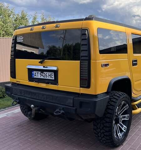 Жовтий Хаммер Н2, об'ємом двигуна 5.97 л та пробігом 175 тис. км за 23000 $, фото 4 на Automoto.ua