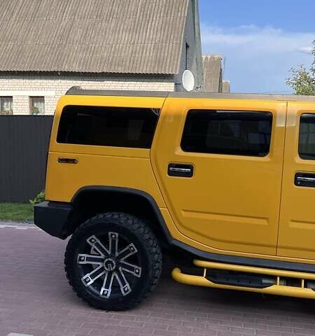 Жовтий Хаммер Н2, об'ємом двигуна 5.97 л та пробігом 175 тис. км за 23000 $, фото 3 на Automoto.ua