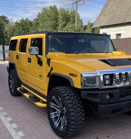 Жовтий Хаммер Н2, об'ємом двигуна 5.97 л та пробігом 175 тис. км за 23000 $, фото 1 на Automoto.ua