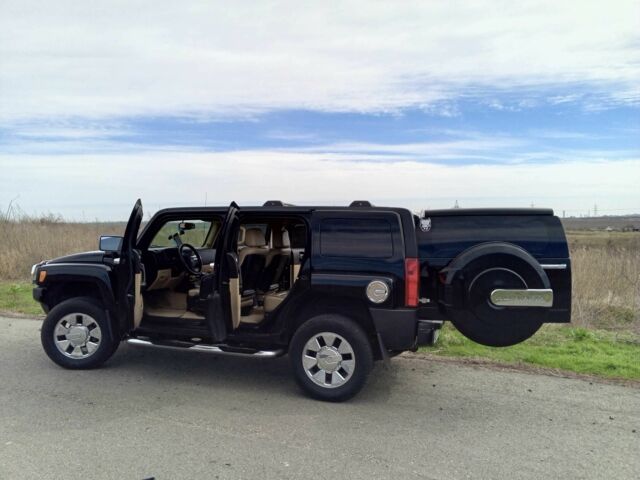 Черный Хаммер Н3, объемом двигателя 3.7 л и пробегом 130 тыс. км за 20000 $, фото 14 на Automoto.ua