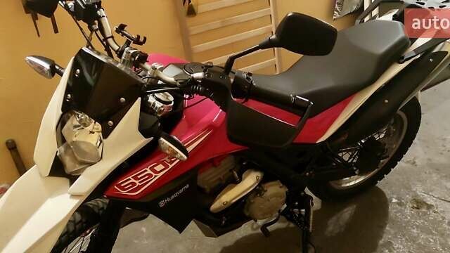 Красный Хускварна ТР, объемом двигателя 0.65 л и пробегом 15 тыс. км за 7000 $, фото 2 на Automoto.ua