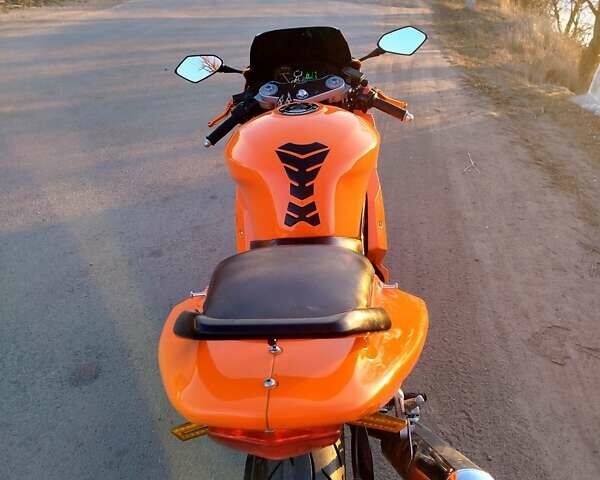 Оранжевый Хьюсонг GT 250R, объемом двигателя 0.25 л и пробегом 55 тыс. км за 1900 $, фото 5 на Automoto.ua