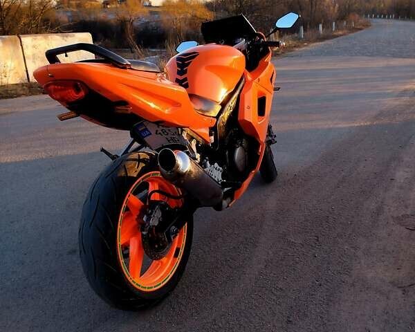 Оранжевый Хьюсонг GT 250R, объемом двигателя 0.25 л и пробегом 55 тыс. км за 1900 $, фото 2 на Automoto.ua
