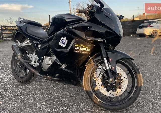 Черный Хьюсонг GT 650R, объемом двигателя 0.65 л и пробегом 27 тыс. км за 3000 $, фото 1 на Automoto.ua