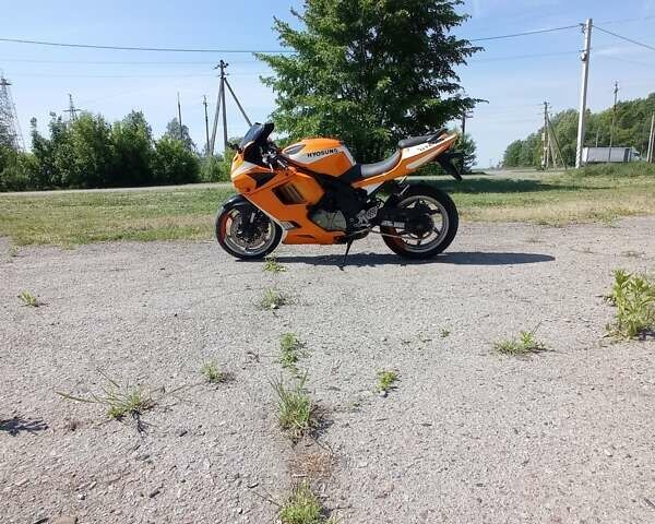 Оранжевый Хьюсонг GT 650R, объемом двигателя 0.65 л и пробегом 37 тыс. км за 3100 $, фото 2 на Automoto.ua