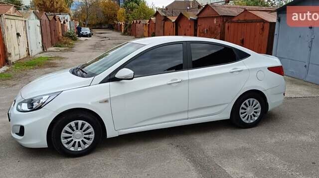 Білий Хендай Акцент, об'ємом двигуна 1.4 л та пробігом 235 тис. км за 6470 $, фото 7 на Automoto.ua
