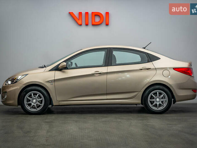 Бежевый Хендай Акцент, объемом двигателя 1.6 л и пробегом 62 тыс. км за 6735 $, фото 3 на Automoto.ua