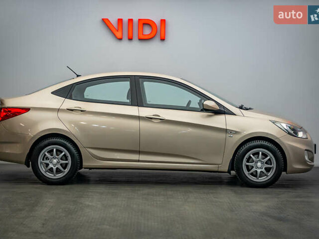 Бежевый Хендай Акцент, объемом двигателя 1.6 л и пробегом 62 тыс. км за 6735 $, фото 4 на Automoto.ua