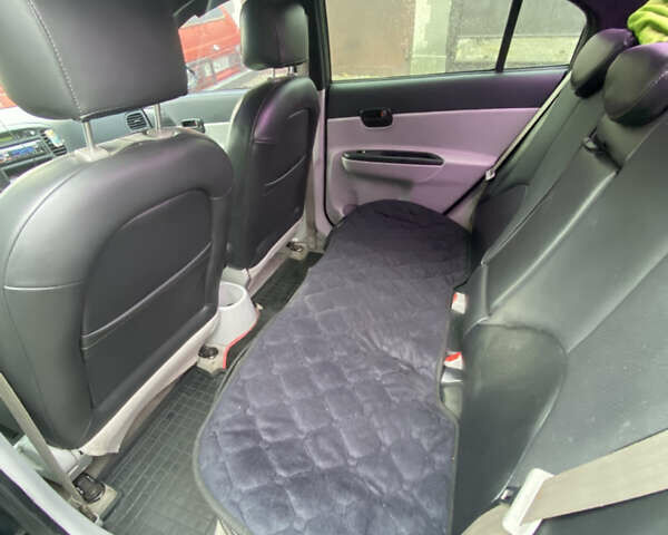 Черный Хендай Акцент, объемом двигателя 1.4 л и пробегом 343 тыс. км за 5000 $, фото 7 на Automoto.ua