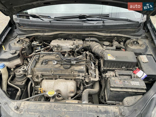 Черный Хендай Акцент, объемом двигателя 1.4 л и пробегом 343 тыс. км за 5000 $, фото 12 на Automoto.ua