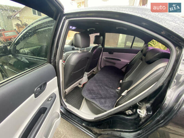 Черный Хендай Акцент, объемом двигателя 1.4 л и пробегом 343 тыс. км за 5000 $, фото 13 на Automoto.ua