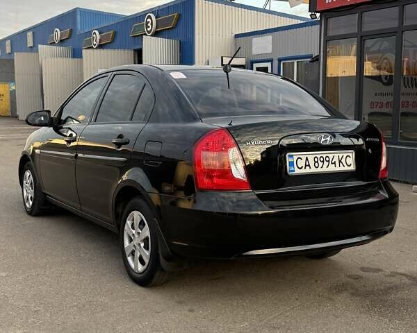 Черный Хендай Акцент, объемом двигателя 1.4 л и пробегом 211 тыс. км за 5400 $, фото 6 на Automoto.ua