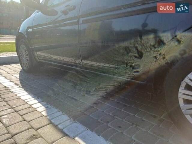 Черный Хендай Акцент, объемом двигателя 1.4 л и пробегом 317 тыс. км за 4000 $, фото 4 на Automoto.ua