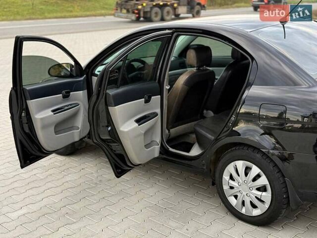 Черный Хендай Акцент, объемом двигателя 1.4 л и пробегом 346 тыс. км за 3350 $, фото 13 на Automoto.ua