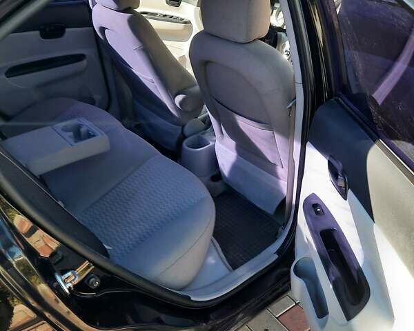 Черный Хендай Акцент, объемом двигателя 1.4 л и пробегом 237 тыс. км за 4800 $, фото 6 на Automoto.ua