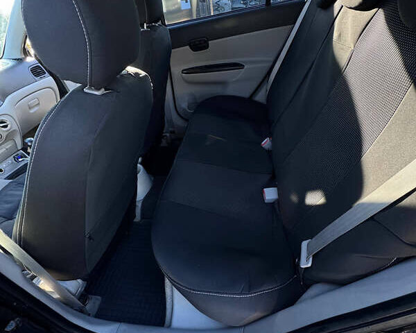 Черный Хендай Акцент, объемом двигателя 1.4 л и пробегом 210 тыс. км за 4050 $, фото 6 на Automoto.ua