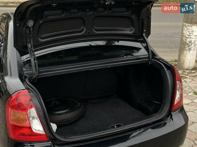 Черный Хендай Акцент, объемом двигателя 1.4 л и пробегом 215 тыс. км за 4799 $, фото 14 на Automoto.ua