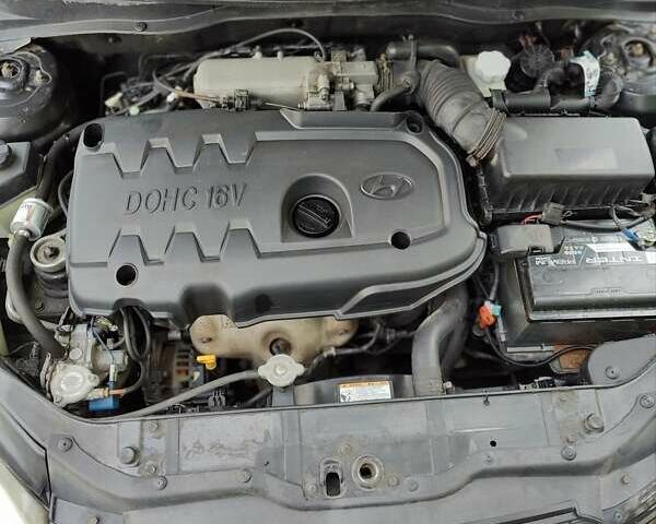 Черный Хендай Акцент, объемом двигателя 1.6 л и пробегом 215 тыс. км за 5200 $, фото 12 на Automoto.ua