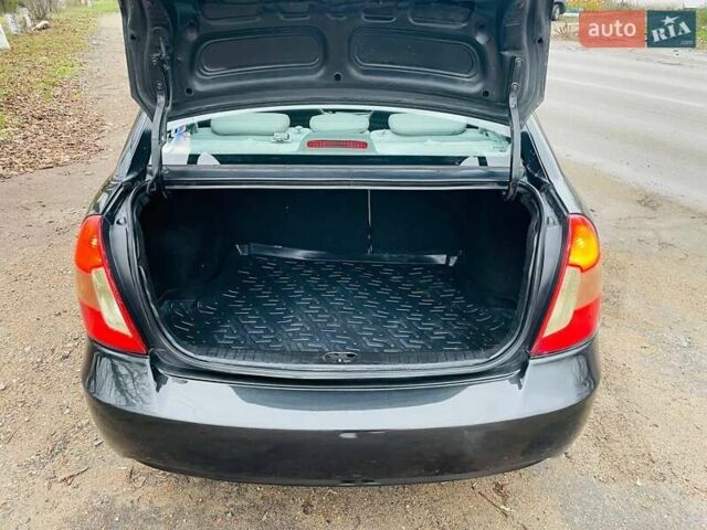 Чорний Хендай Акцент, об'ємом двигуна 1.4 л та пробігом 225 тис. км за 3899 $, фото 13 на Automoto.ua