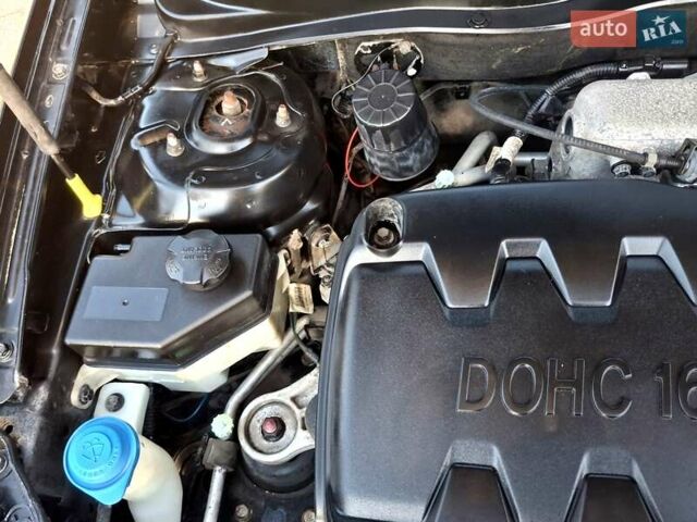 Черный Хендай Акцент, объемом двигателя 1.4 л и пробегом 157 тыс. км за 6200 $, фото 16 на Automoto.ua