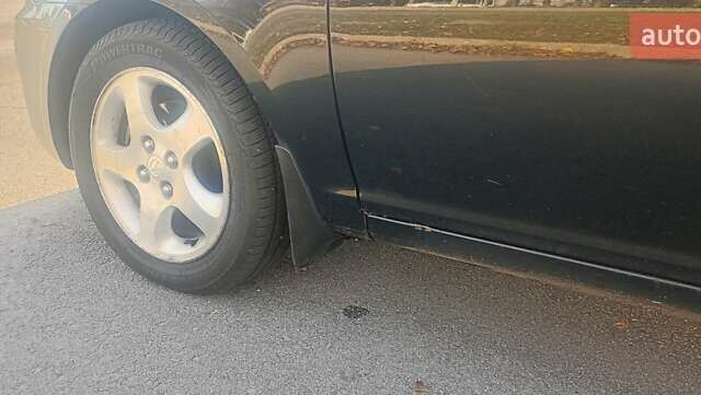 Черный Хендай Акцент, объемом двигателя 1.49 л и пробегом 204 тыс. км за 5280 $, фото 5 на Automoto.ua