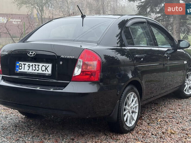 Черный Хендай Акцент, объемом двигателя 1.4 л и пробегом 139 тыс. км за 5999 $, фото 10 на Automoto.ua
