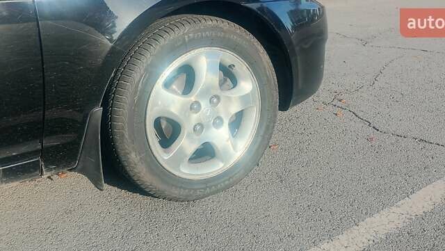 Черный Хендай Акцент, объемом двигателя 1.49 л и пробегом 204 тыс. км за 5280 $, фото 9 на Automoto.ua