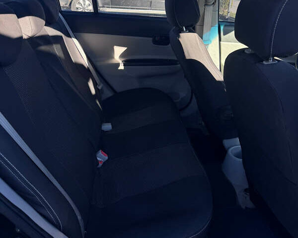 Черный Хендай Акцент, объемом двигателя 1.4 л и пробегом 210 тыс. км за 4050 $, фото 7 на Automoto.ua