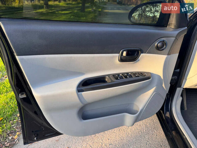 Черный Хендай Акцент, объемом двигателя 1.4 л и пробегом 128 тыс. км за 5800 $, фото 27 на Automoto.ua