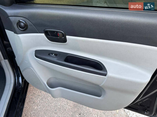 Черный Хендай Акцент, объемом двигателя 1.4 л и пробегом 128 тыс. км за 5800 $, фото 59 на Automoto.ua