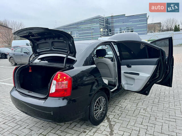 Черный Хендай Акцент, объемом двигателя 1.4 л и пробегом 221 тыс. км за 4950 $, фото 24 на Automoto.ua